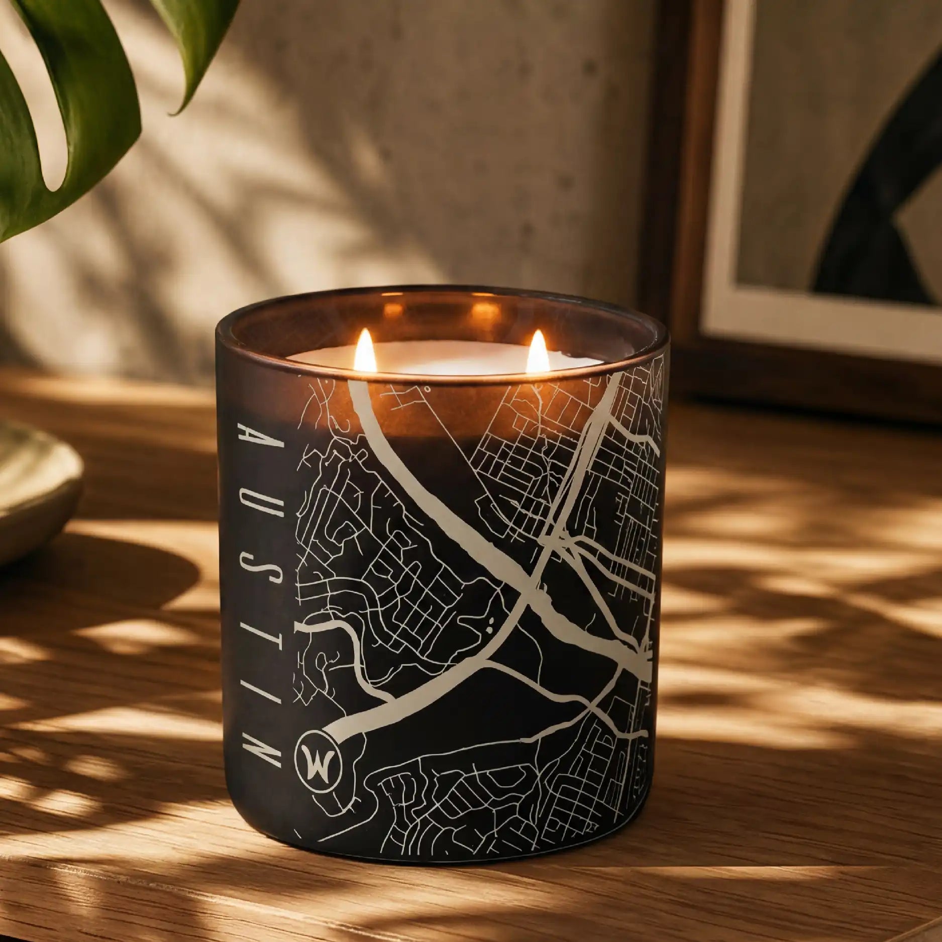 Glowing etched candle of Austin map in black
