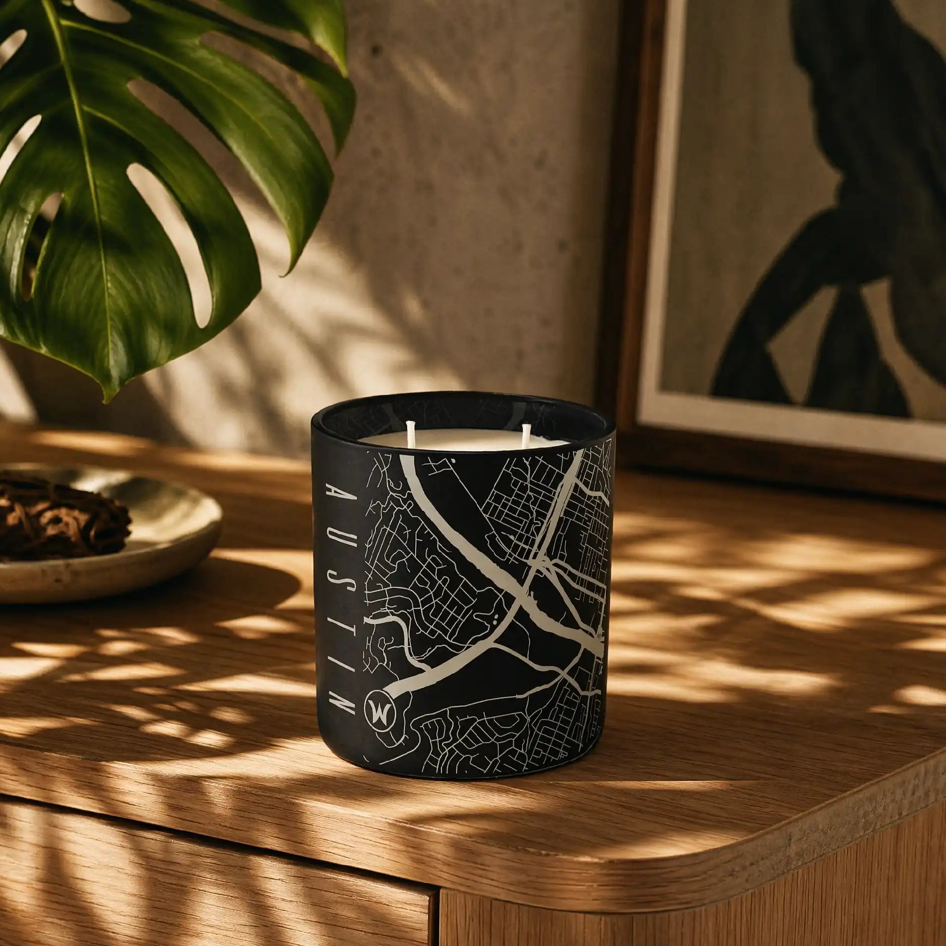 Custom etched Austin map candle on table as decor piece