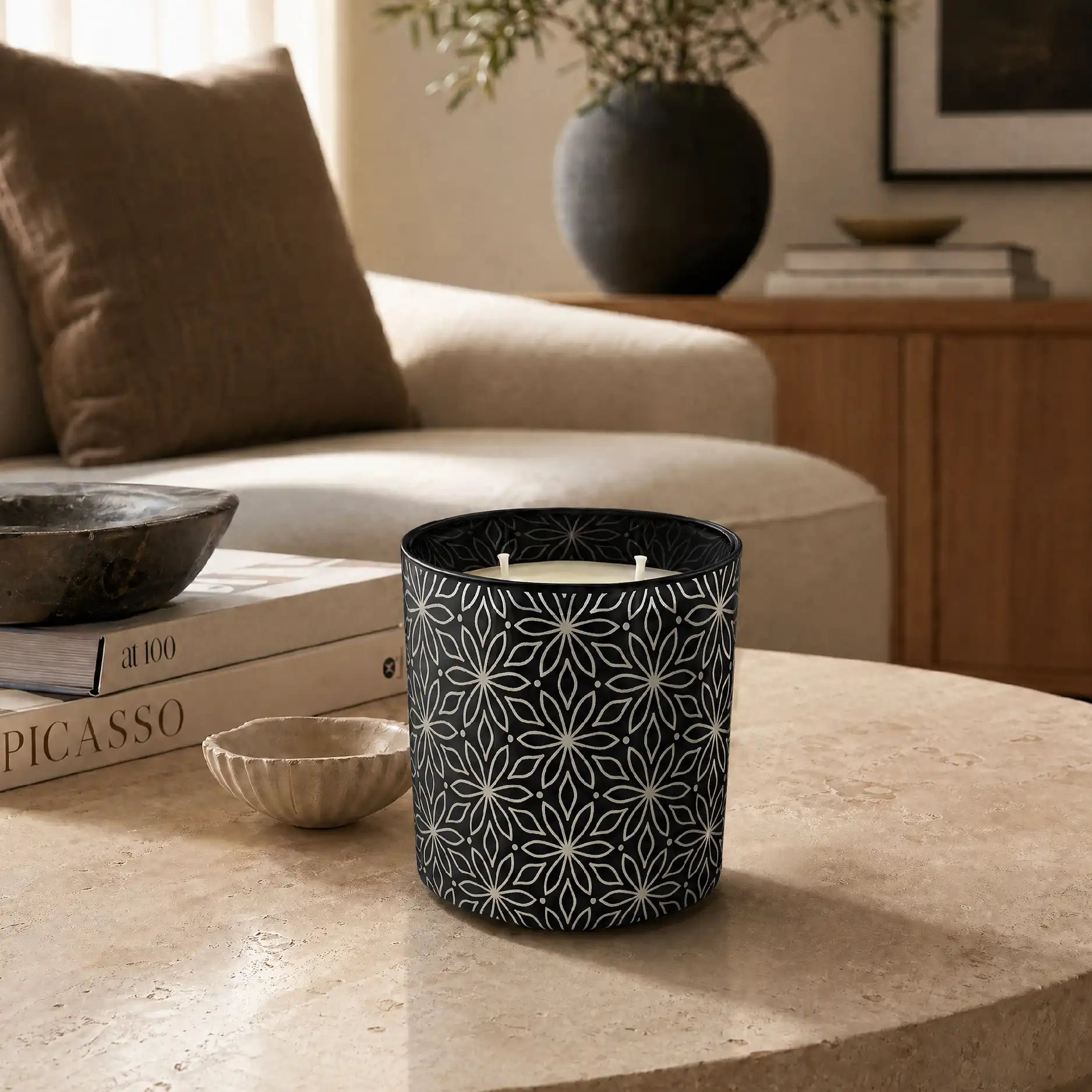 Custom etched candle with petal design as decor piece